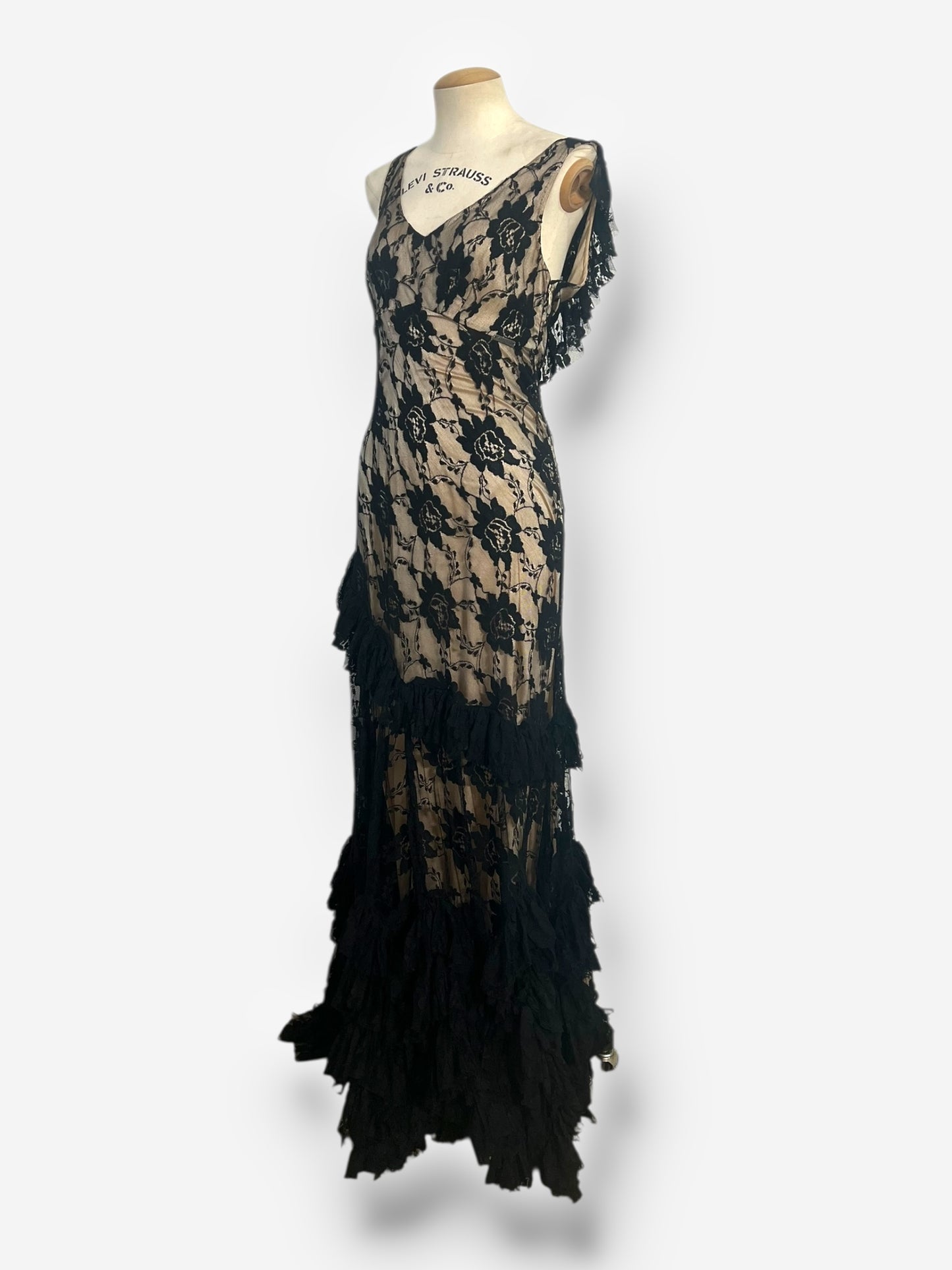 John Galliano, Spanish-Influenced Tiered Black Lace Bias-Cut Gown, 2010s